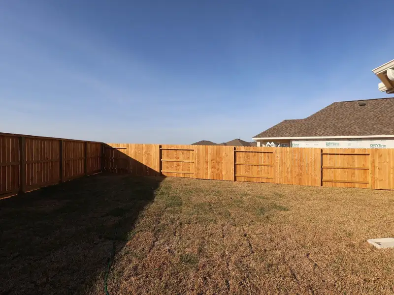 Exterior details and patio area of a home in Marvida, Cypress (Image 4).