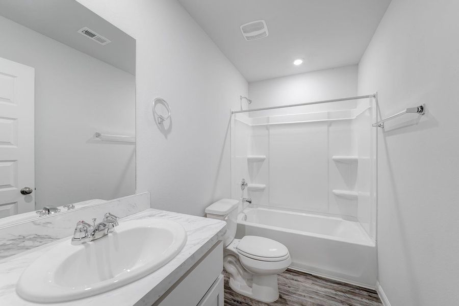 Furnished interior view inside a new home in Pirate's Cove Estates, Vidor (Image 10).
