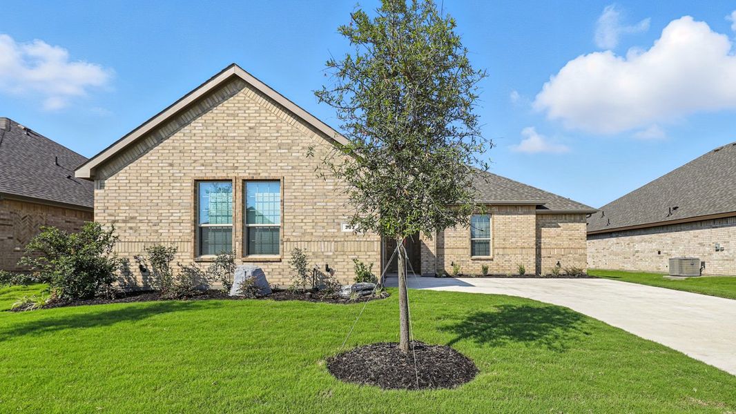Representative exterior photo of a completed home built from the Bridge City by D.R. Horton in Retta Estates, Mansfield, TX (Image 2).