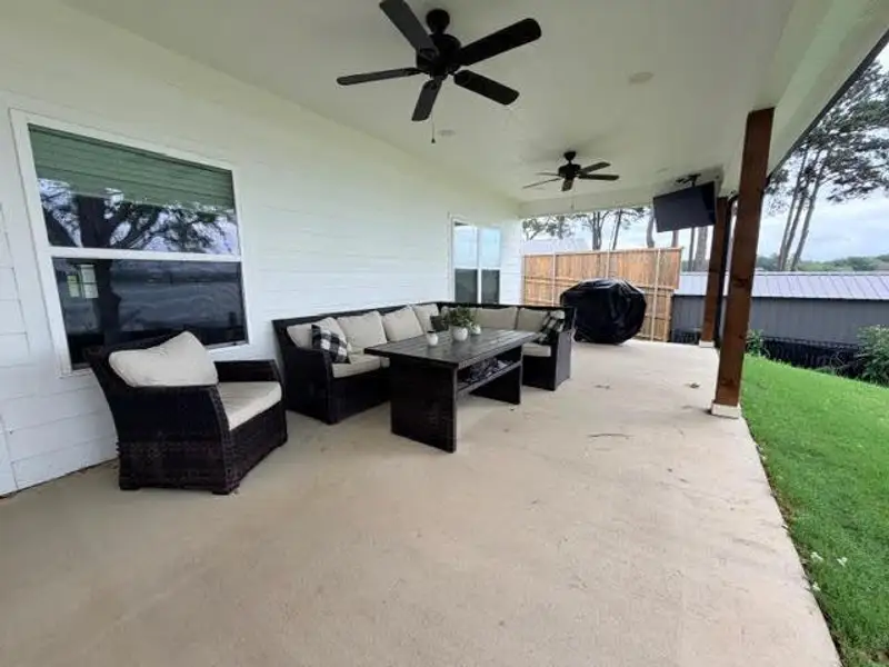 Exterior details and patio area of a home in , Flint (Image 3).