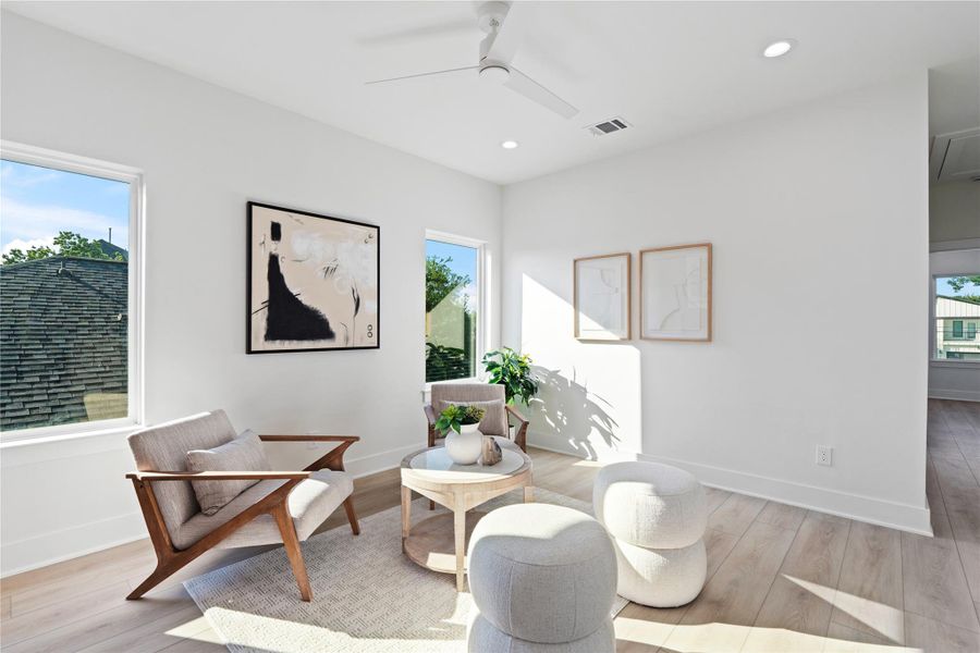 Oversized windows in the secondary living area flood the space with natural light, keeping it bright and airy throughout the day. The combination of sunlight and Scandinavian-inspired design creates a warm, inviting atmosphere perfect for relaxing or entertaining. It’s a versatile space where comfort and style meet effortlessly. Oversized windows in the secondary living area flood the space with natural light, keeping it bright and airy throughout the day. The combination of sunlight and Scandinavian-inspired design creates a warm, inviting atmosphere perfect for relaxing or entertaining. It’s a versatile space where comfort and style meet effortlessly.