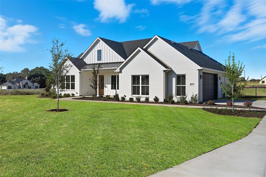 Front exterior of a new home in , Boyd, TX, highlighting curb appeal (Image 1).
