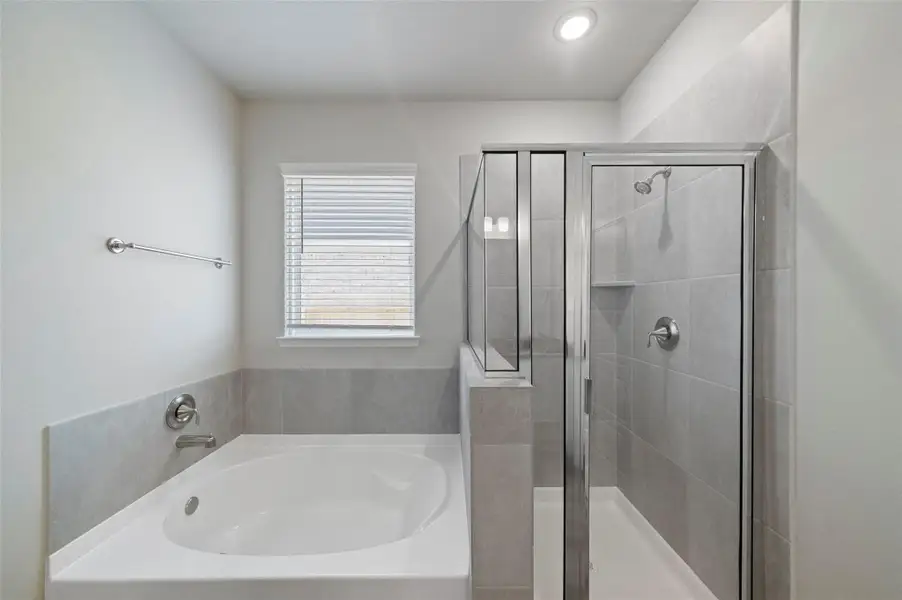 Furnished interior view inside a new home in Sunterra, Katy (Image 6).