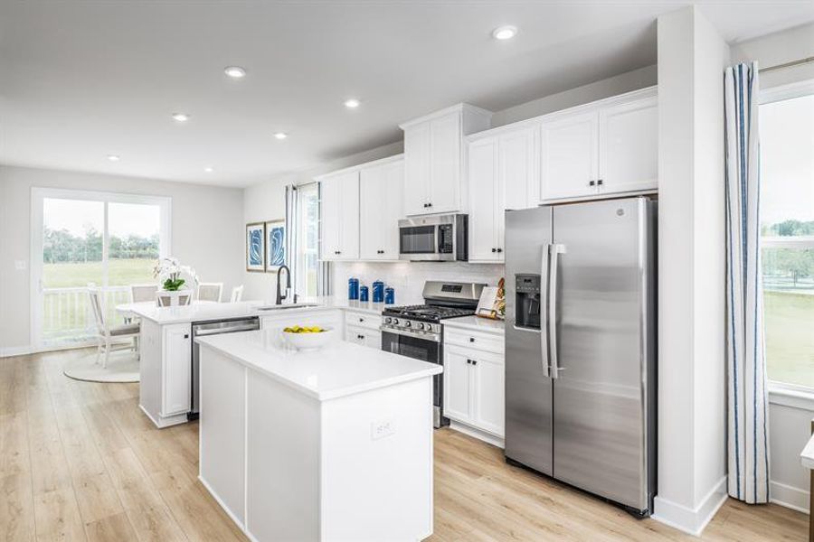 Representative furnished interior of a home built from the Clarendon 3 Story by Ryan Homes in Ashmore Square, Charlotte (Image 2).