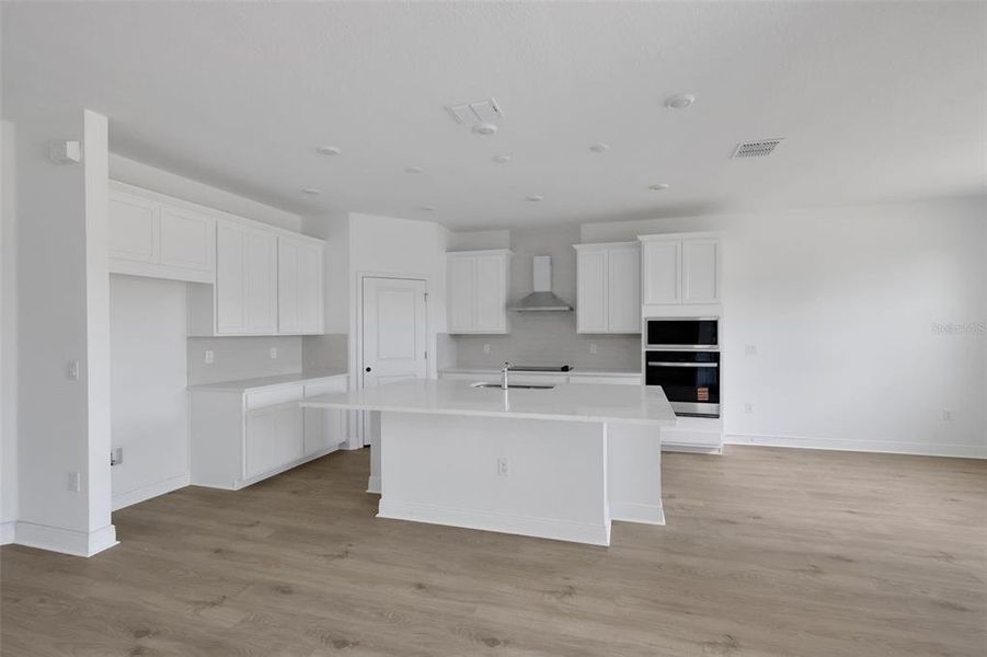 Furnished interior view inside a new home in Serenade at Ovation, Winter Garden (Image 12). Furnished interior view inside a new home in Serenade at Ovation, Winter Garden (Image 12).