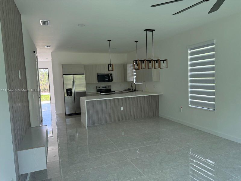 Furnished interior view inside a new home in , Punta Gorda (Image 11).