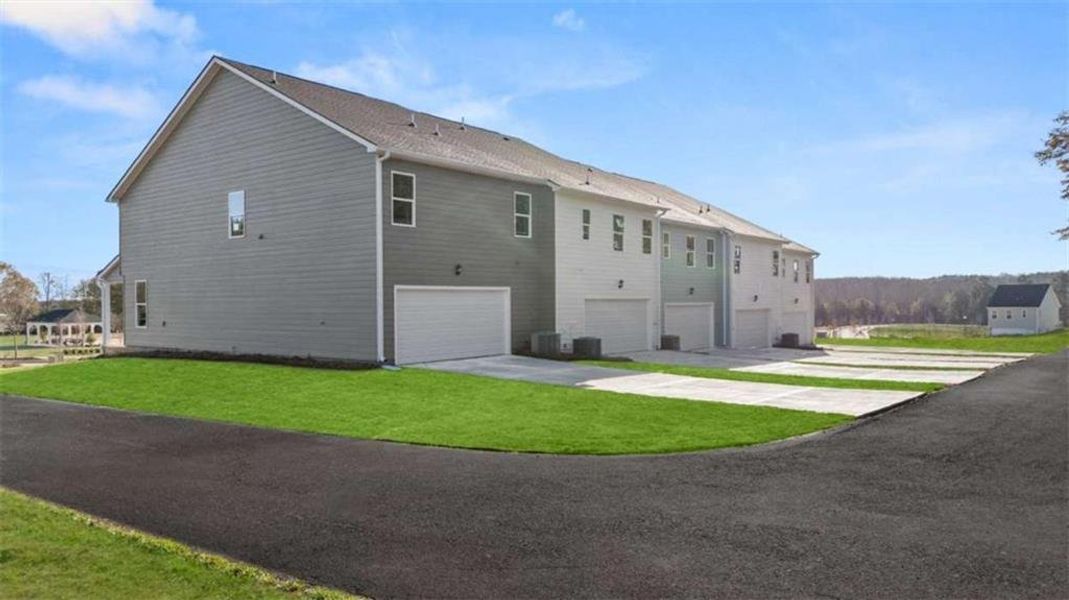 Exterior details and patio area of a home in Brookland Commons, Monroe (Image 3).