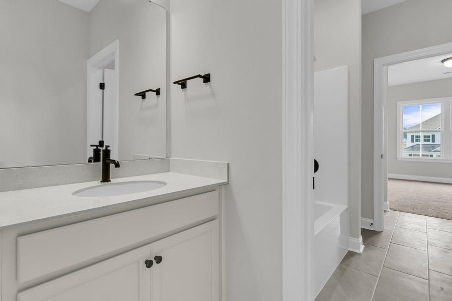 Furnished interior view inside a new home in Tidewater at Lakes of Cane Bay, Summerville (Image 11).