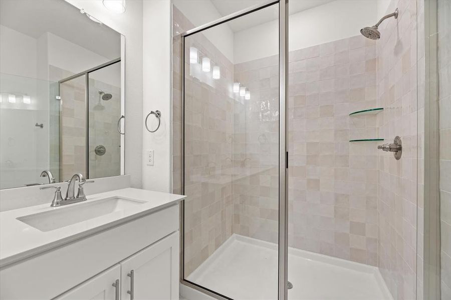 You'll find a lovely, spacious walk in shower in this dream owner's bath!