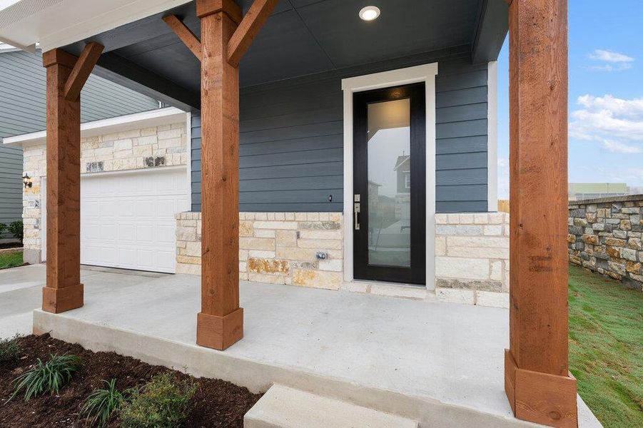 Exterior details and patio area of a home in Covered Bridge, Hutto (Image 27).