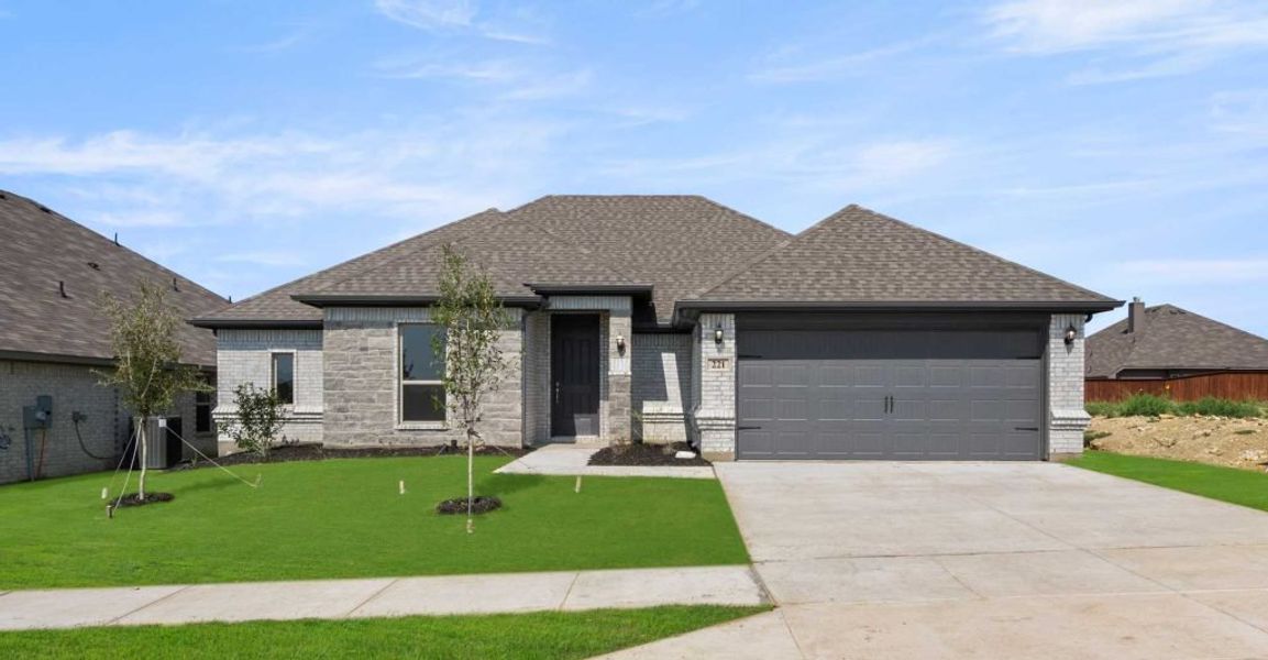 Representative exterior photo of a completed home built from the Alderbury by Impression Homes in Timberbrook, Justin, TX (Image 1).