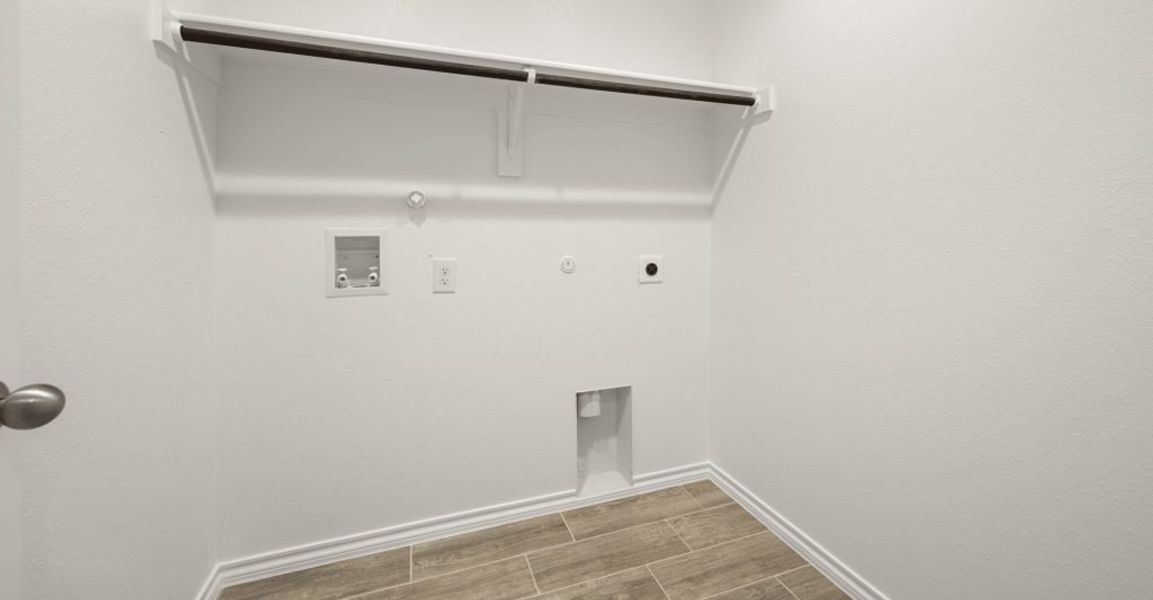 Representative exterior photo of a completed home built from the Boston by Impression Homes in Baker Farms, Cleburne, TX (Image 24).