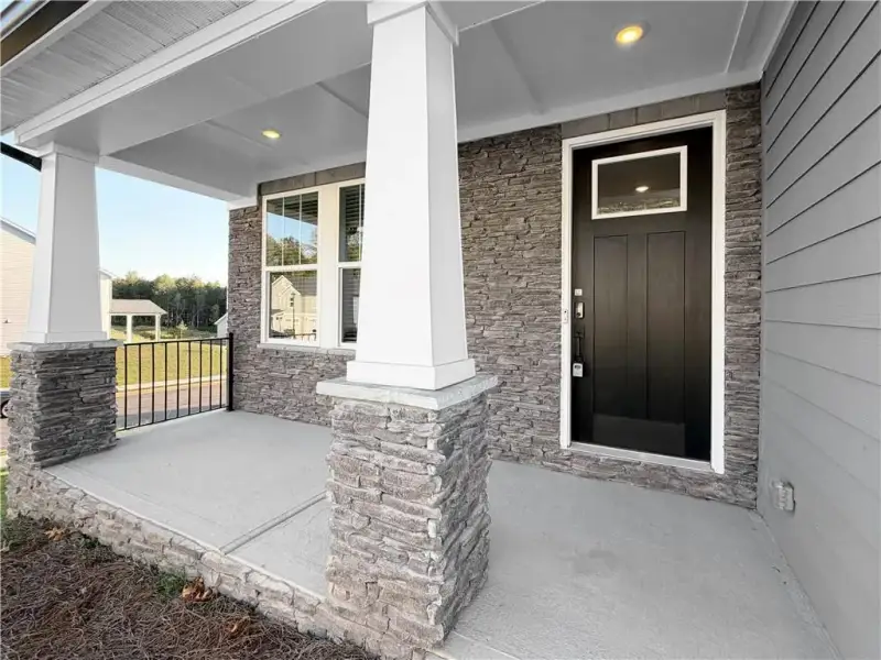 Exterior details and patio area of a home in Vines at Mill Creek - Legacy Series, Braselton (Image 2). Exterior details and patio area of a home in Vines at Mill Creek - Legacy Series, Braselton (Image 2).