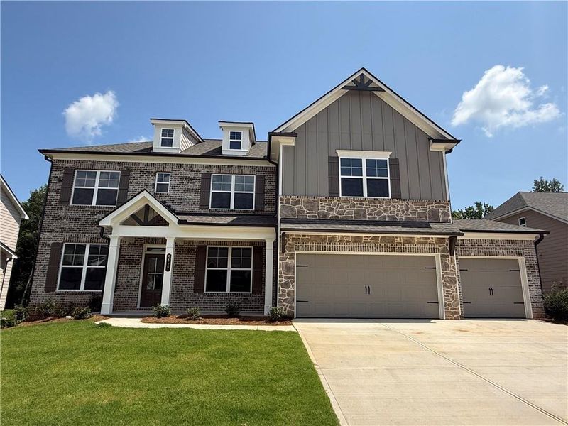 Front exterior of a new home in Ponderosa Farms Manor, Gainesville, GA, highlighting curb appeal (Image 29). Front exterior of a new home in Ponderosa Farms Manor, Gainesville, GA, highlighting curb appeal (Image 29).