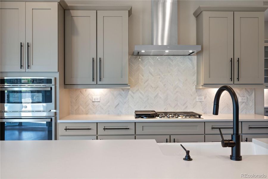 Hand laid Herring Bone Backsplash