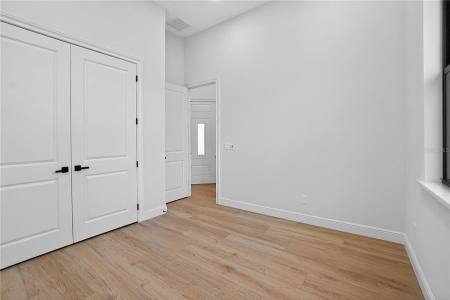 Spacious, unfurnished interior of a new home in , Port Charlotte (Image 77).