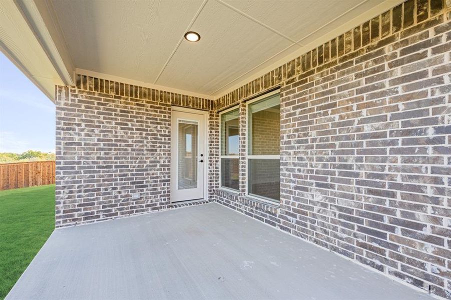Exterior details and patio area of a home in Wildcat Ridge, Godley (Image 2).