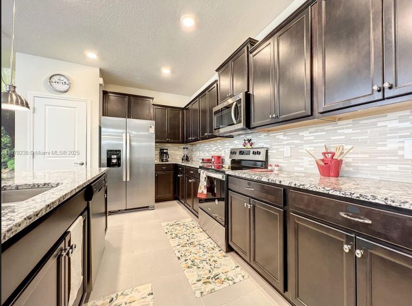 Furnished interior view inside a new home in , Davenport (Image 6).