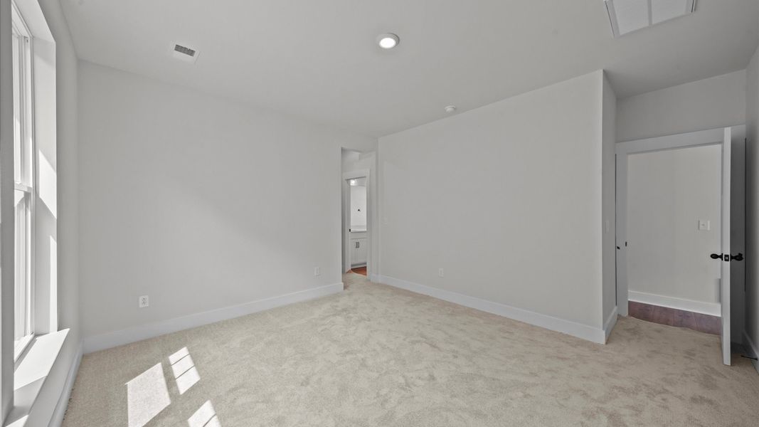 Tasteful primary suite featuring modern finishes and superior comfort near Downtown Anderson