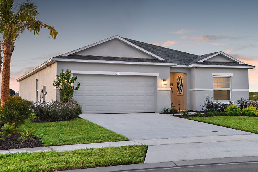 Representative exterior photo of a completed home built from the Goldfinch by Taylor Morrison in Solena, North Fort Myers, FL (Image 13).