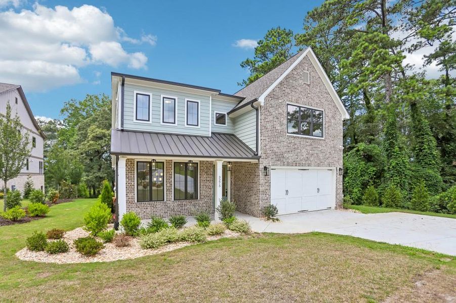 Front exterior of a new home in , Marietta, GA, highlighting curb appeal (Image 2). Front exterior of a new home in , Marietta, GA, highlighting curb appeal (Image 2).