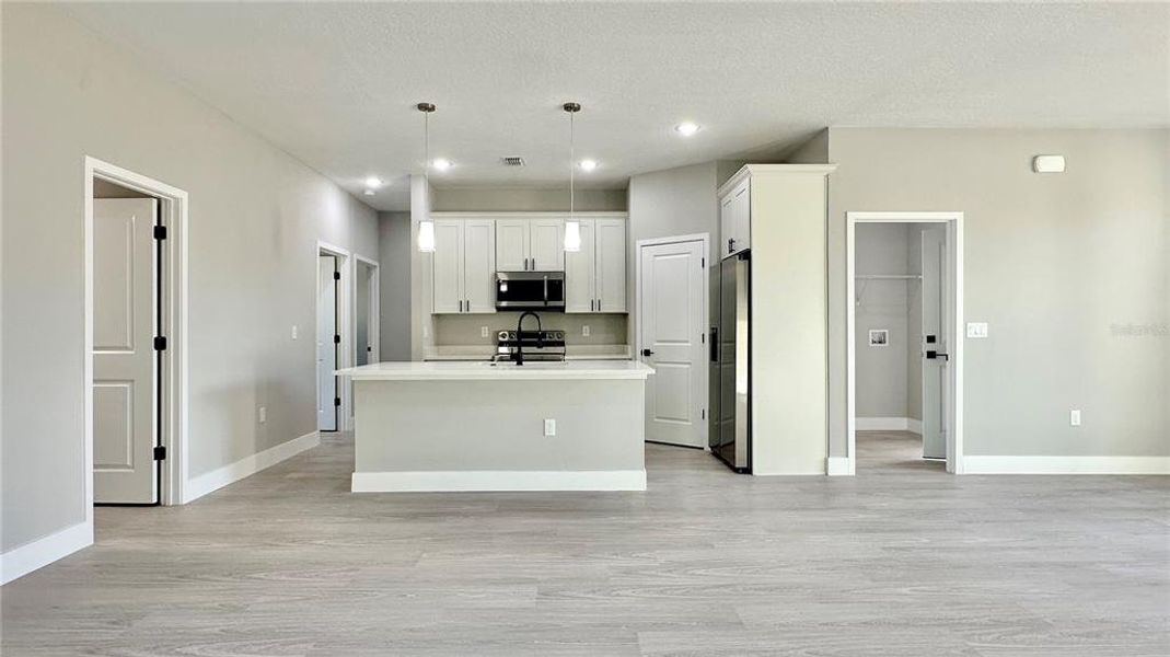 Furnished interior view inside a new home in , Poinciana (Image 13).