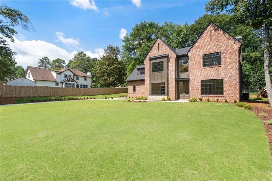 Front exterior of a new home in , Snellville, GA, highlighting curb appeal (Image 33).