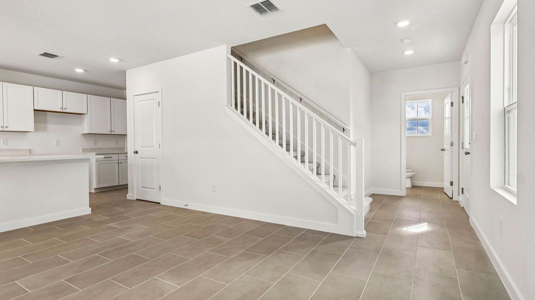 Furnished interior view inside a new home in Cyrene at Harmony, St. Cloud (Image 9).