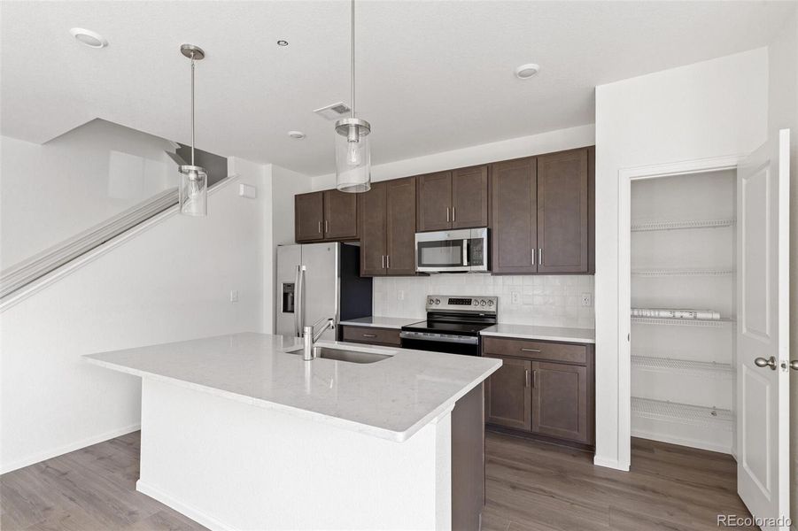 Furnished interior view inside a new home in Turnberry, Commerce City (Image 4).