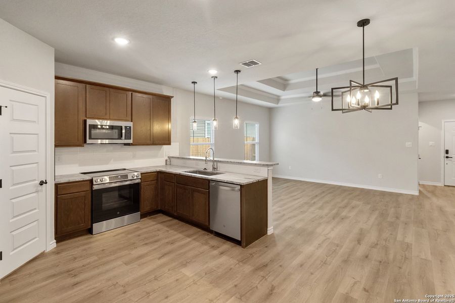 Furnished interior view inside a new home in , Beeville (Image 7).