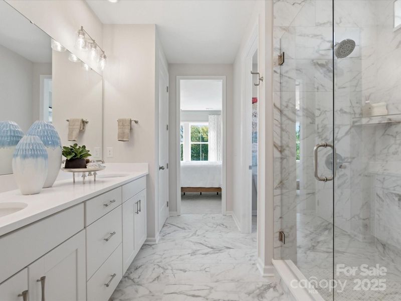 Primary En Suite Bath with Dual Vanity. *Model Photos | Actual Finishes, Structural Selections, and Orientation May Vary.