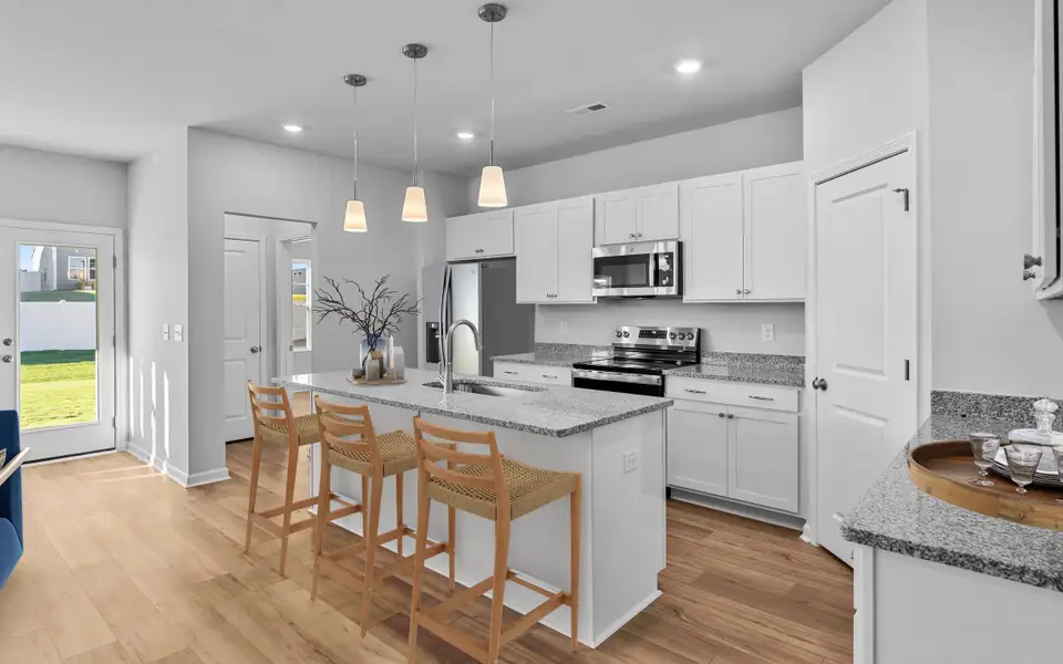 Representative furnished interior of a home built from the Ford - Genesis Value Collection by Mungo Homes in Golden Ridge, Youngsville (Image 4).