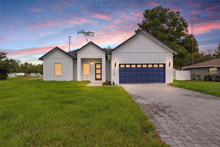 Front exterior of a new home in , Ocala, FL, highlighting curb appeal (Image 21).