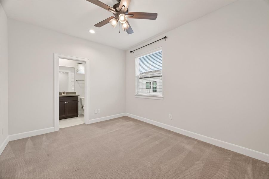 Spacious, unfurnished interior of a new home in The Corner At Buffalo Pointe, Houston (Image 37).
