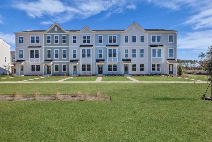 Front exterior of a new home in Westpark at Cane Bay, Summerville, SC, highlighting curb appeal (Image 1). Front exterior of a new home in Westpark at Cane Bay, Summerville, SC, highlighting curb appeal (Image 1).