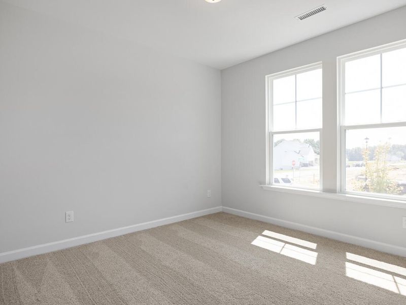 Spacious, unfurnished interior of a new home in Retreat at North Main, Lillington (Image 18).