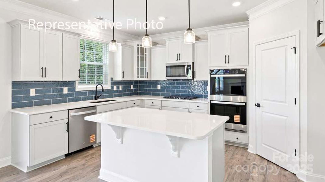 Furnished interior view inside a new home in Sanctuary at Southgate, Indian Trail (Image 2).