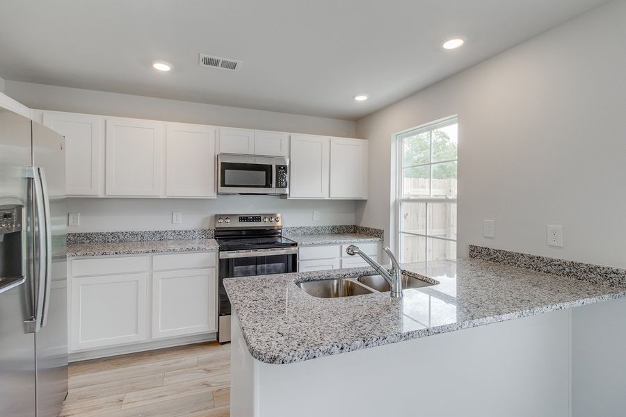 Furnished interior view inside a new home in Padgett Commons, Hopkins (Image 7).