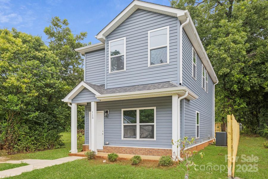Front exterior of a new home in , Rock Hill, SC, highlighting curb appeal (Image 13).