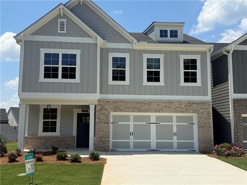 Front exterior of a new home in , Canton, GA, highlighting curb appeal (Image 1). Front exterior of a new home in , Canton, GA, highlighting curb appeal (Image 1).