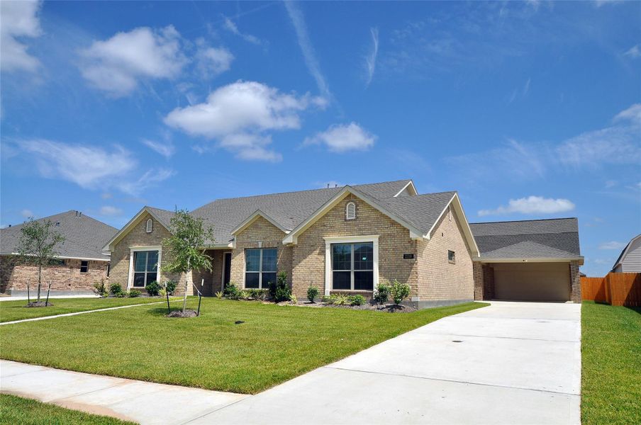 Front exterior of a new home in , League City, TX, highlighting curb appeal (Image 23). Front exterior of a new home in , League City, TX, highlighting curb appeal (Image 23).