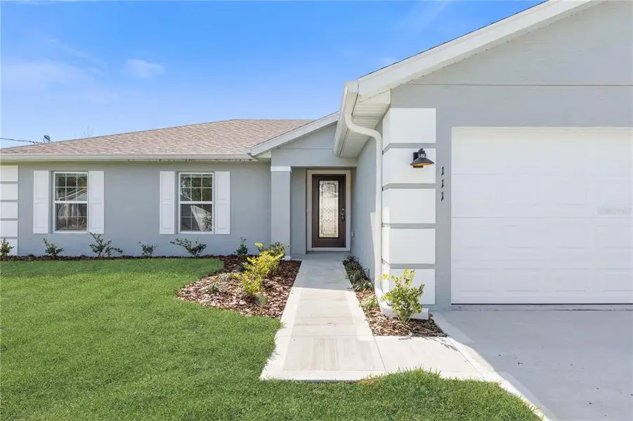 Exterior details and patio area of a home in , Palm Coast (Image 3).