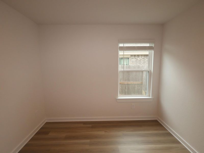 Spacious, unfurnished interior of a new home in Pinewood at Grand Texas, New Caney (Image 13).