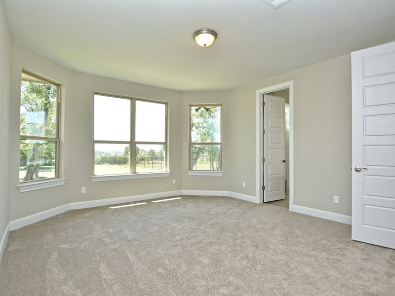 Representative unfurnished interior of a home built from the Santa Barbara II by Giddens Homes in Scofield Farms Estates, Georgetown (Image 110).