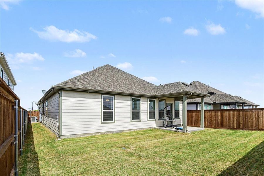 Exterior details and patio area of a home in Waterscape, Royse City (Image 4).