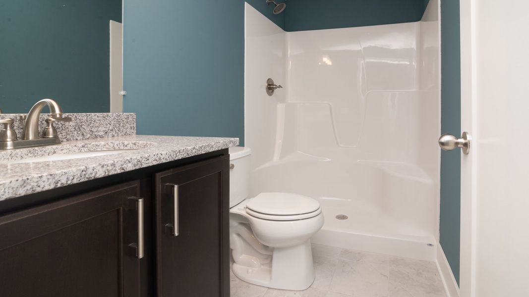 Representative furnished interior of a home built from the The Hartland by Norfolk Homes in Coronado Estates, Jackson (Image 33).