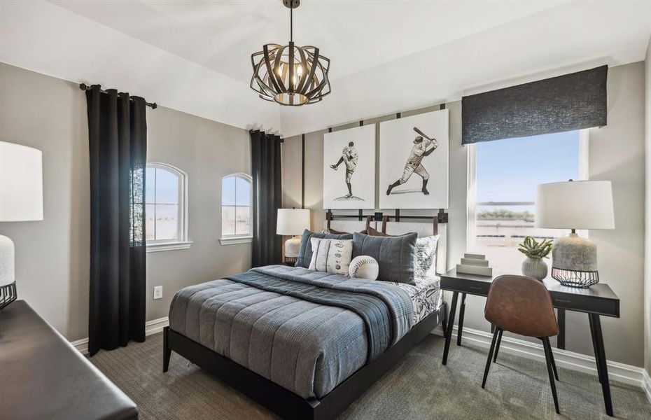 Secondary bedroom designed with generous storage solutions *Model representation