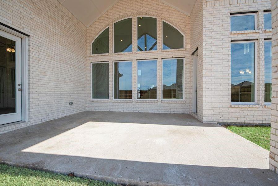 Exterior details and patio area of a home in Park Trails, Forney (Image 23).