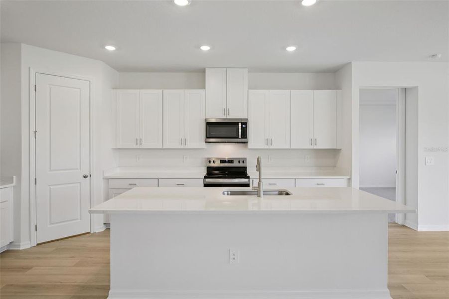 Furnished interior view inside a new home in Coasterra - Reserve Series, Palmetto (Image 12). Furnished interior view inside a new home in Coasterra - Reserve Series, Palmetto (Image 12).