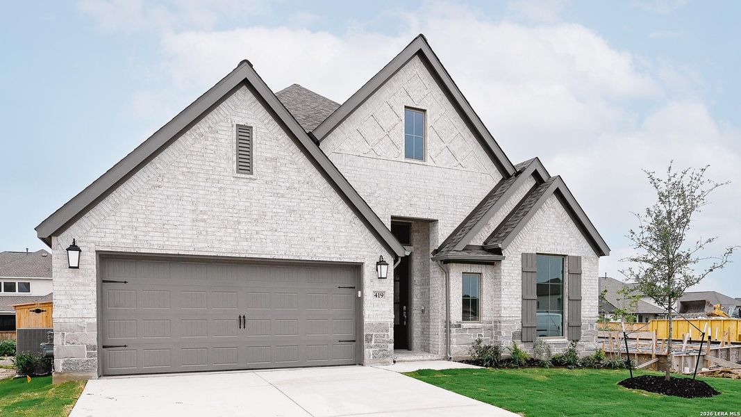 Front exterior of a new home in Mayfair, New Braunfels, TX, highlighting curb appeal (Image 21).